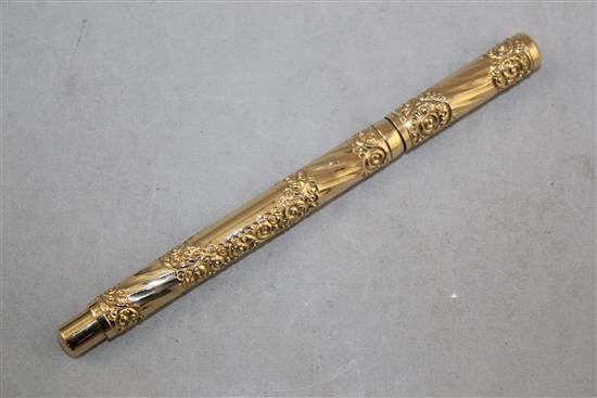 The Swan Pen. An embossed gold plated fountain pen, by Mabie Todd, 5.25in.